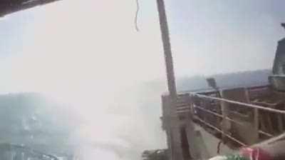 Somali pirates try to board a ship that has private security guards aboard