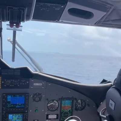 Sea plane landing at the Westin Maldives