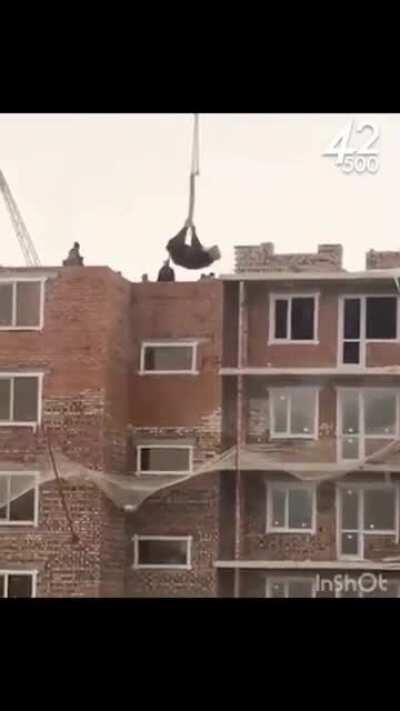 In Nur-Sultan ascended cow with a construction crane