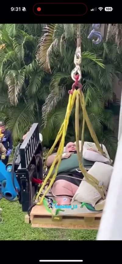 Crane lifted out apartment for medical attention