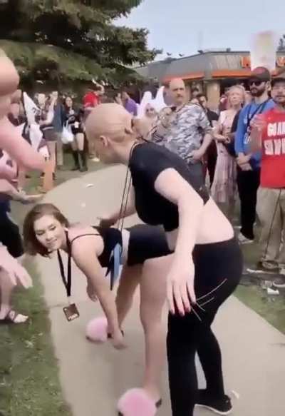 Woman twerks at group that was protesting at an anime convention