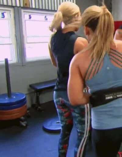 Natalya spanking Lana's ass