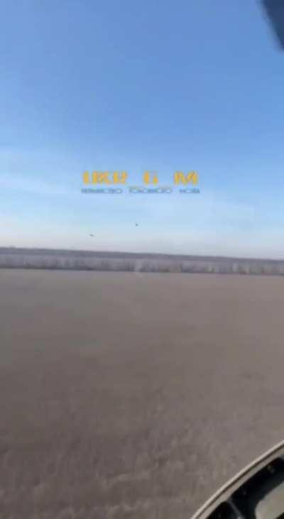 ru pov: Pair of Russian Su-25 jets filmed from cockpit of Russian helicopter in Ukraine