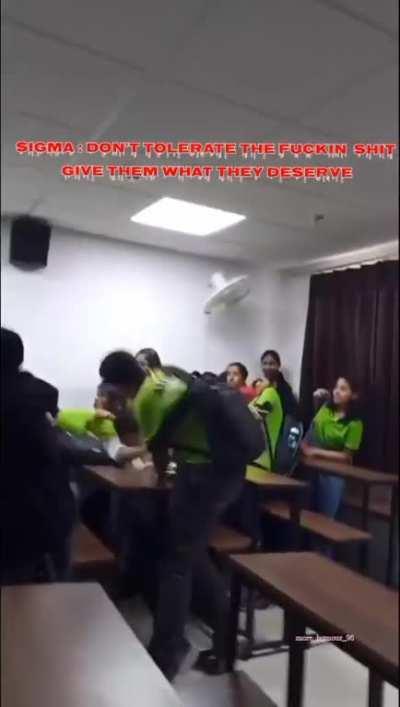 Bruh had a belt and still lost XDDDD. [Green shirt guy was stopped by grey shirt guy (not the one was gettin beaten up well he has white shirt) because when he was betting the guy with belt ,white shirt guy belt accdentally hits one of the girl]