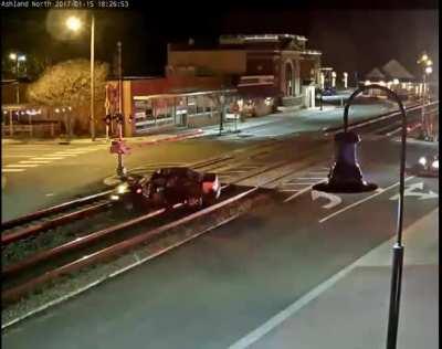 Train Pushes Car off of Track