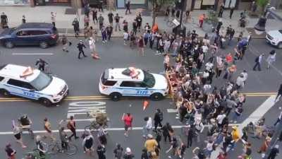 NYPD cars drive into crowd of George Floyd protesters