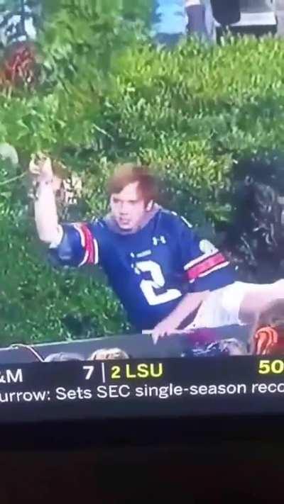 Girl gets stuck in a bush after Auburn vs Alabama game