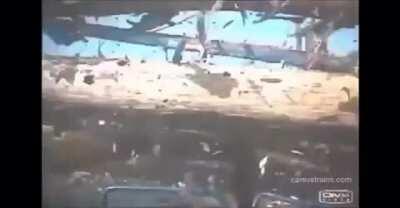 Train hits log truck