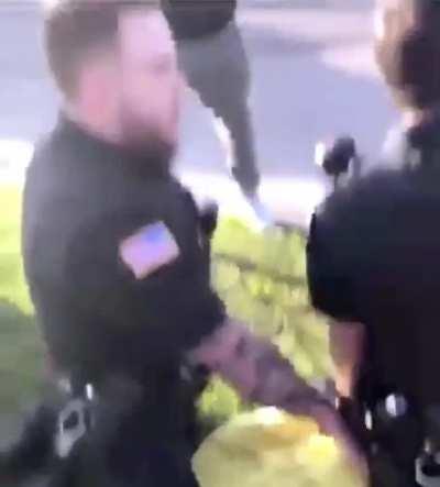 Knee to the neck of a 14 year old teenager