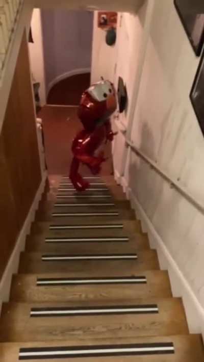 Elmo balloon rises up the stairs by itself. Almost feels like it's alive at 3 am.