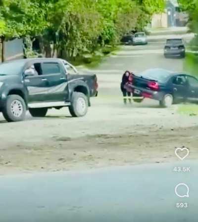 Trying to tow a car from a ditch! Ops