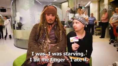 Johnny Depp explaining his finger injury to children in 2015