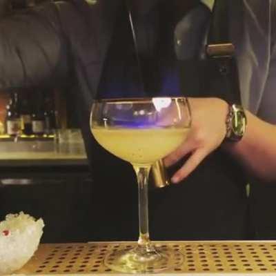 This bartender making a drink