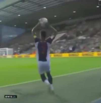 Fan gives his jacket so the ball can be dried and it pays off