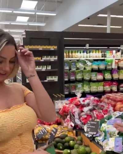 Feeding her friends a milkshake