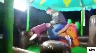 Just two bros riding a bull