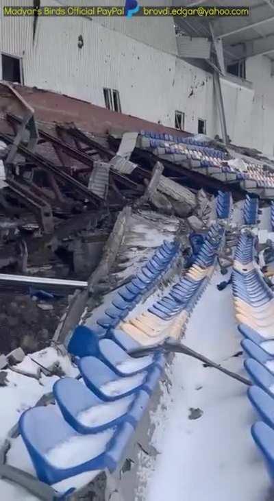 Madyar - UA drone recon. Madyar walking through the damaged Bahmut sports arena, meeting a Bahmut cat, watching his unit scouting and providing coords to the artillery. 31st Jan. Subtitled