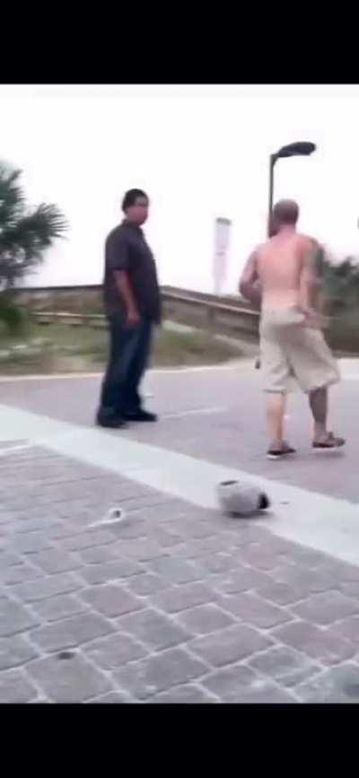 Guy gets choked out for spitting in his face.