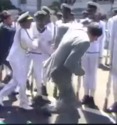 Navy sailor strikes Indian prime minister with a rifle as an assassination attempt in Sri Lanka-1987.