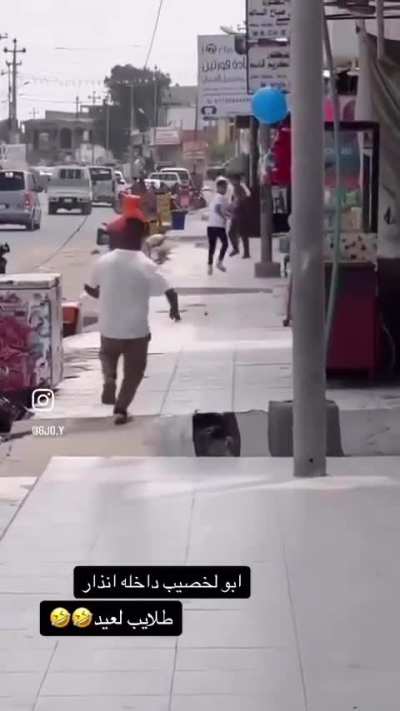 Man with Down Syndrome sprints down street with an AK47, terrifying local children.