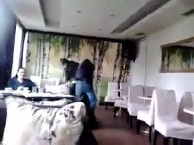 Fight breaks out between a Bosnian Man and a Bosnian Woman in a Sarajevo Cafe. - (WITH AUDIO)