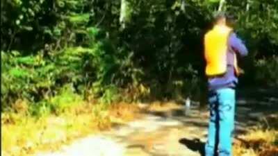 Guy almost kills himself looking down the barrel of his gun