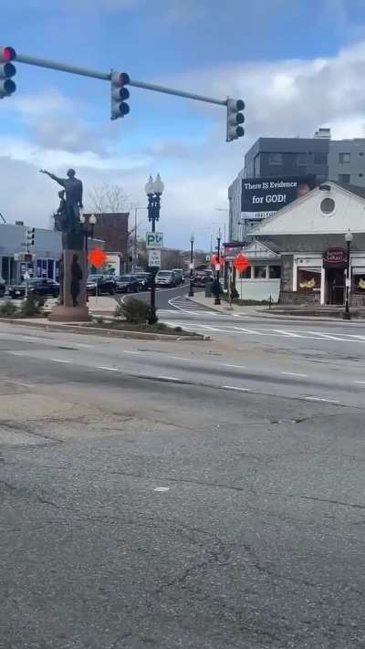 Dumbass rides on the top of the car