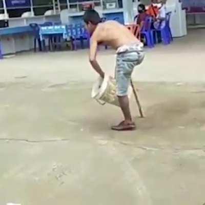 Idiot fights a bucket