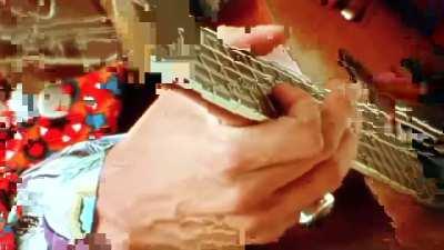 Just Jimi Hendrix playing an acoustic guitar (1967)