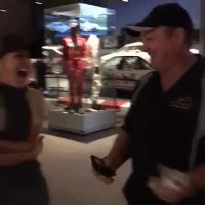 Australian TV Presenter Charli Robinson/Delaney (Most Famous As Former Hi-5 Presenter) Squeezing Her Fully Covered Boobs Together Using Her Arms. (Mostly Suggestive, You Don't Really See Anything) (Wearing Tight Dress) (Also With Slo-Mo) (Poor Picture Qua