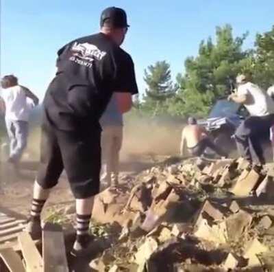 launches ATV at his friends.