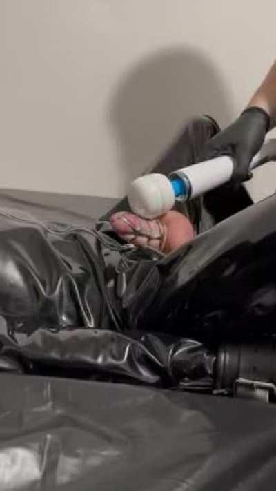 Use my magic wand on his caged cock 😈