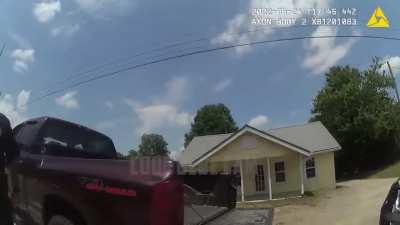 Two police officers threaten to arrest each other