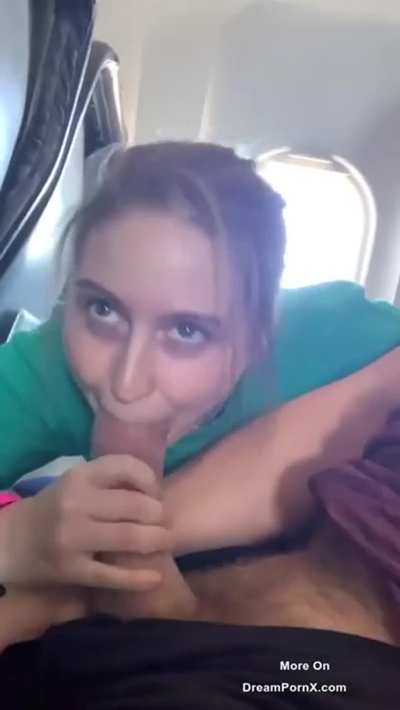 Sneaky blowjob in a plane