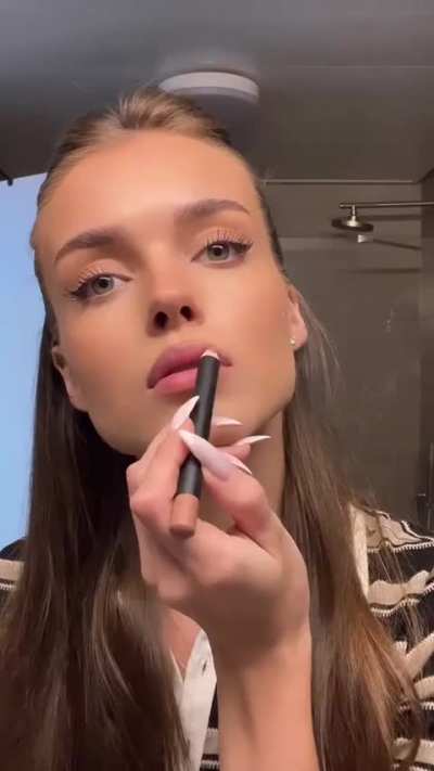 Doing Her Makeup