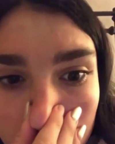 Forcing smoke to come out of her eyes