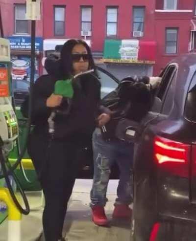 She’s doing a hand job to a fuel pipe?