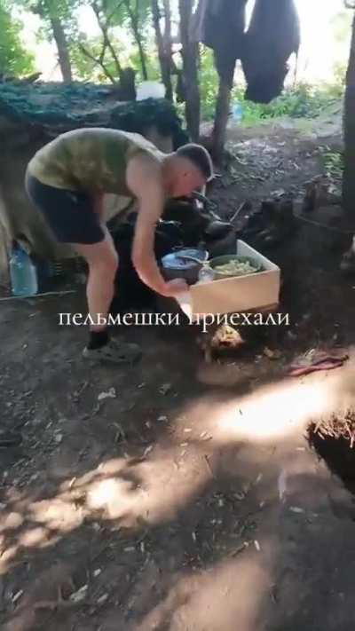 RU POV: Russian soldiers are cooking pelmeni for lunch 