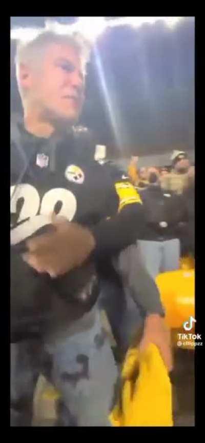 trashy woman throws beer all over man and his young son.