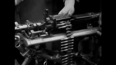 German soldiers show military equipment to civilians during a 