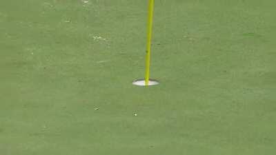 Jon Rahm skips the ball across the pond for the hole-in-one!