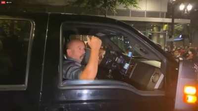 Surrounding a car and intimidating and threatening the occupants