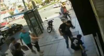 Guy hits old man and gets served street justice