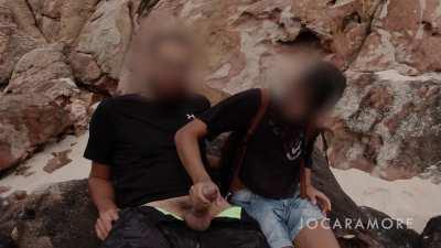 My sneaky girlfriend makes me cum right on the public beach!