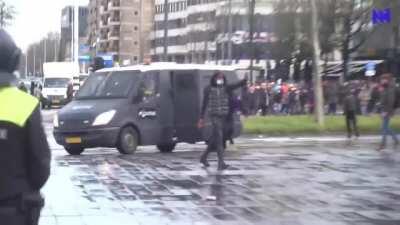 Hooligan taunts riot police