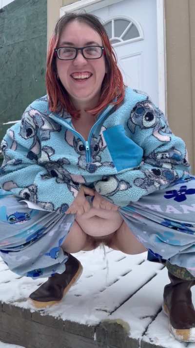 Wifey melting some snow on front porch this morning 