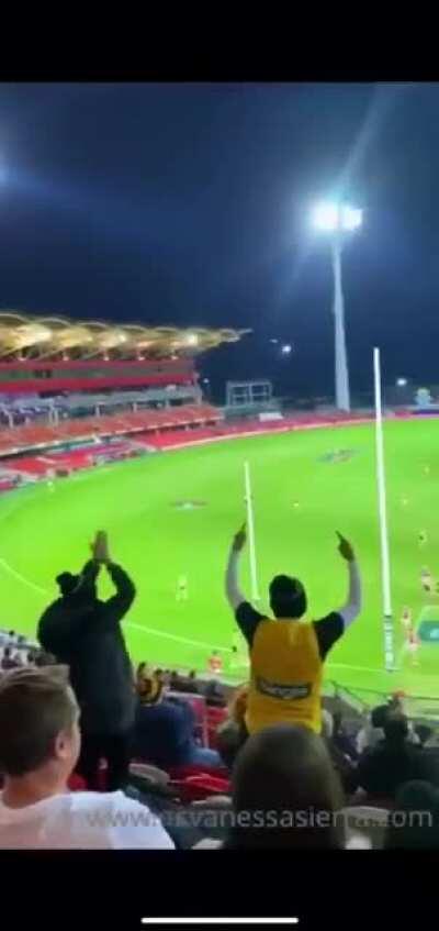 Flashing her tits at an AFL game