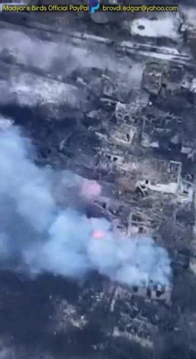 Madyar - UA drone recon. Outskirts of Bahmut. Looking over ru trenches, a few artillery hits, a few charges dropped from drones. Morning of 9th Feb. Subtitled