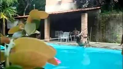 WCGW thightroping over a swimming pool