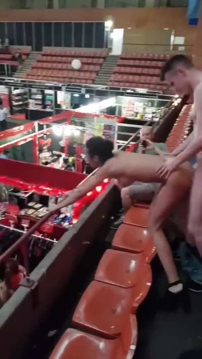 Partners give a performance during a sex convention